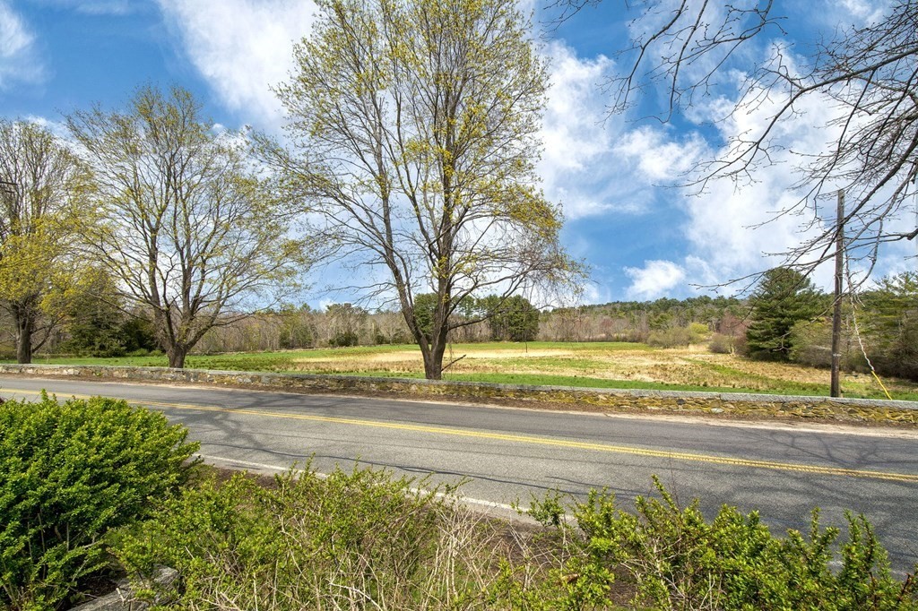 128 Washington Street, Unit F Hanover, MA 02339 - Photo 31 of 42 a view of an ocean with a nearby houses