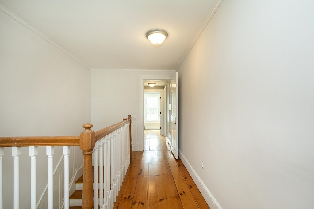 128 Washington Street, Unit F Hanover, MA 02339 - Photo 38 of 42 a view of a hallway