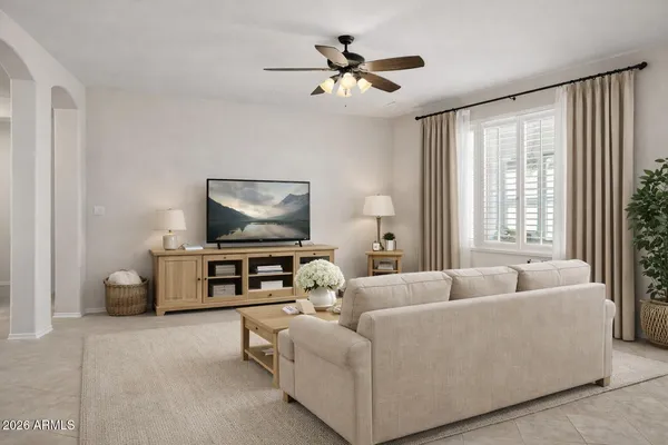 a bedroom with a large bed and a couch