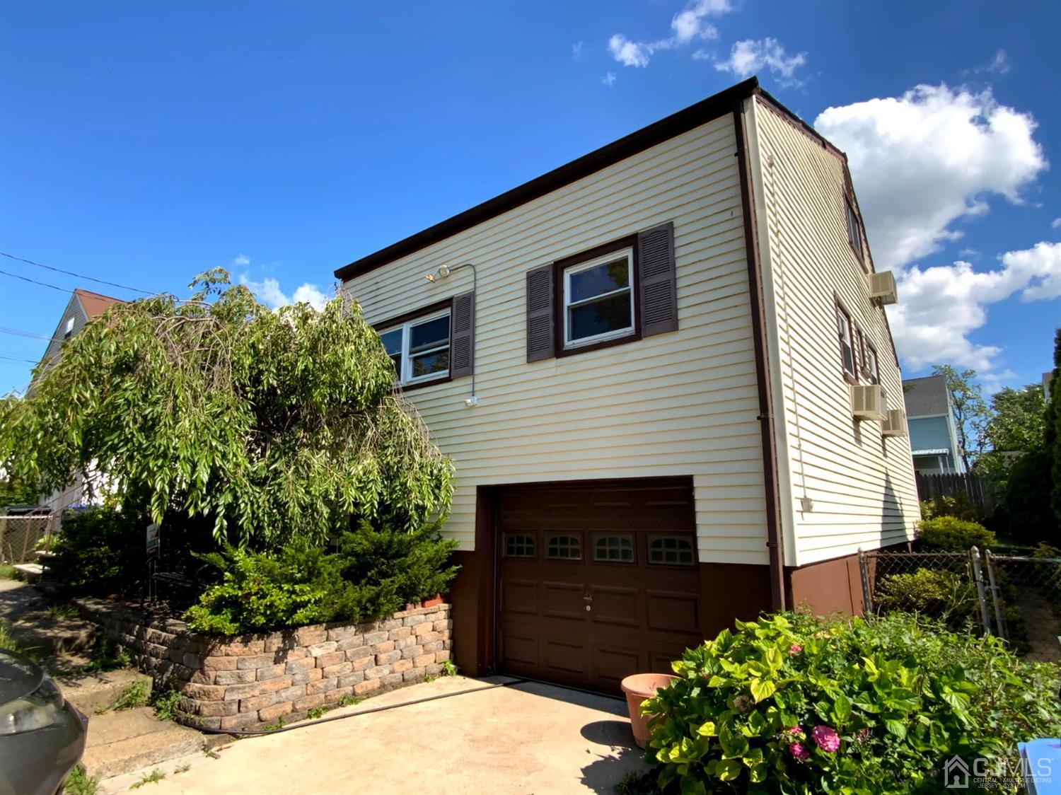56 Farmingdale Road Fords, NJ 08863 - Photo 18 of 18 a front view of a house with a yard