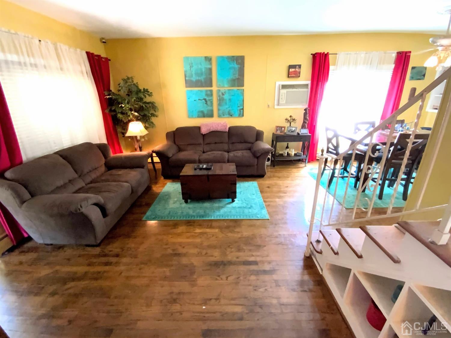 56 Farmingdale Road Fords, NJ 08863 - Photo 4 of 18 a living room with furniture and a wooden floor