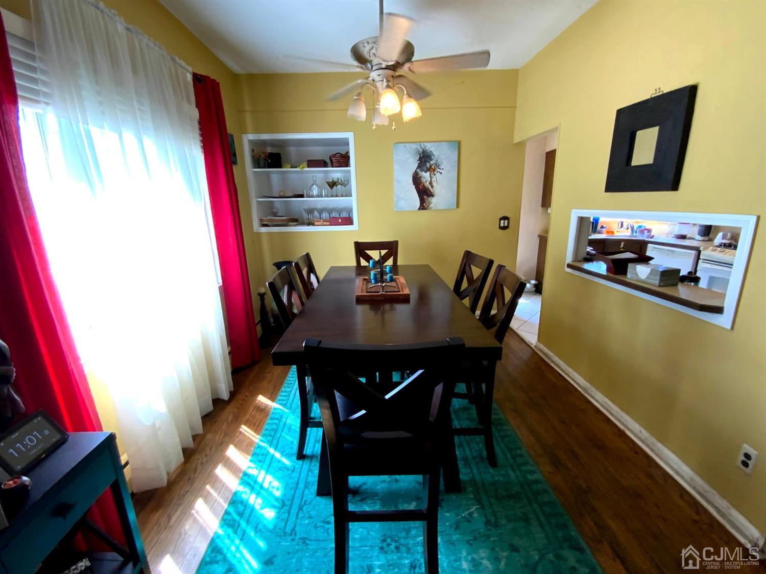56 Farmingdale Road Fords, NJ 08863 - Photo 6 of 18 a view of a dining room with furniture and wooden floor
