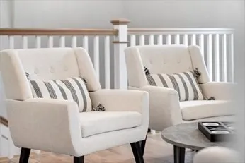 a living room with furniture and a couch