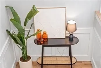 a view of a room with a table and a chair