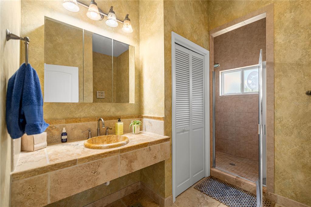 3817 North Calusa Point Crystal River, FL 34428 - Photo 22 of 54 a bathroom with a sink and a mirror