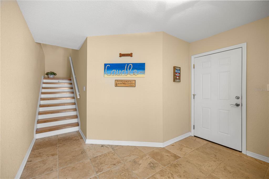 3817 North Calusa Point Crystal River, FL 34428 - Photo 27 of 54 a view of an entryway with staircase
