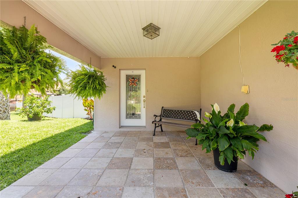 3817 North Calusa Point Crystal River, FL 34428 - Photo 3 of 54 a view of a porch with furniture and a yard