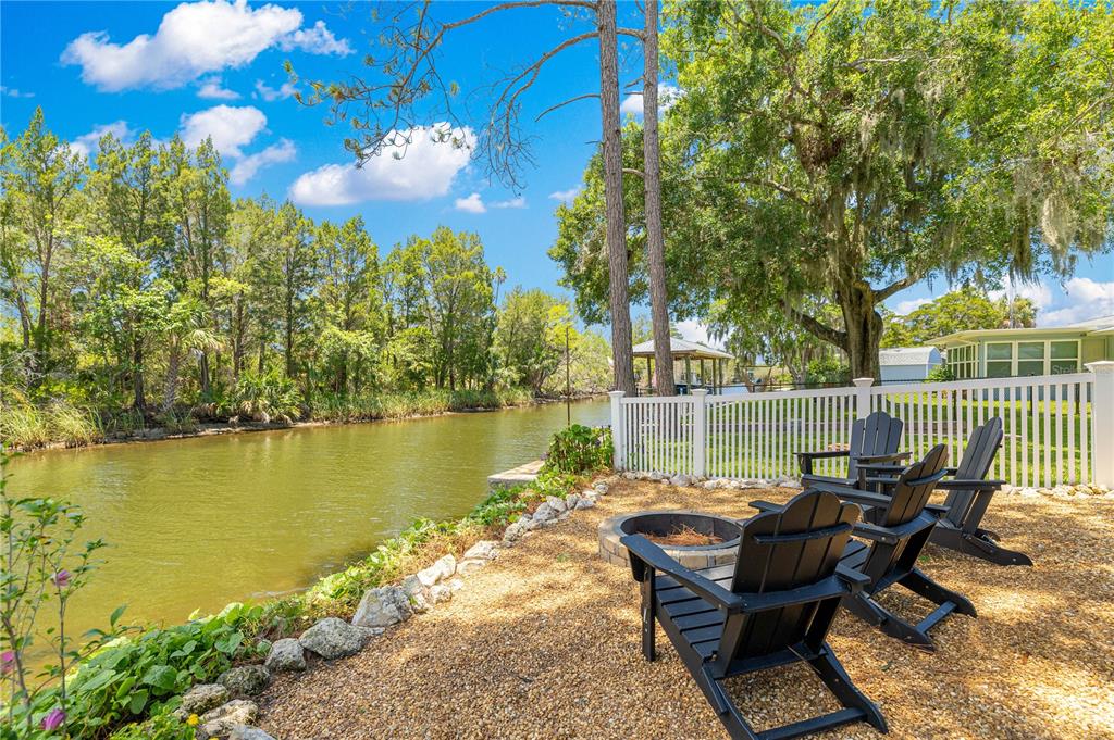 3817 North Calusa Point Crystal River, FL 34428 - Photo 39 of 54 a view of a backyard with sitting area
