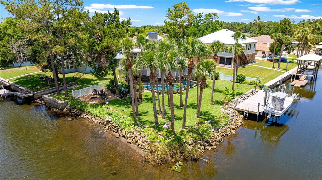 3817 North Calusa Point Crystal River, FL 34428 - Photo 45 of 54 a view of swimming pool with outdoor seating and lake view