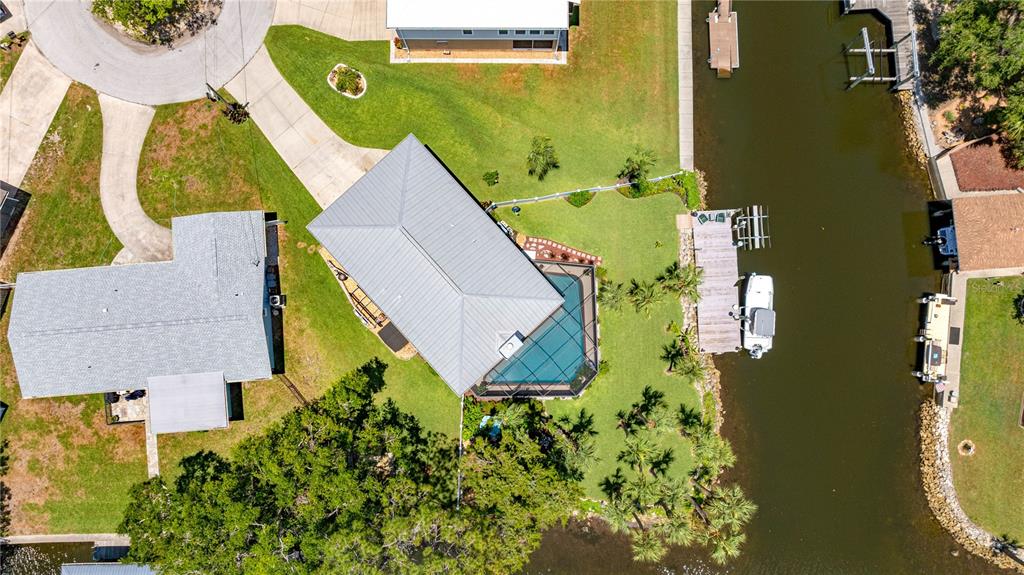 3817 North Calusa Point Crystal River, FL 34428 - Photo 46 of 54 an aerial view of a house with a swimming pool