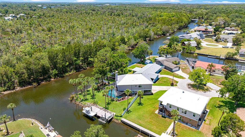 3817 North Calusa Point Crystal River, FL 34428 - Photo 53 of 54 an aerial view of a house with a lake view