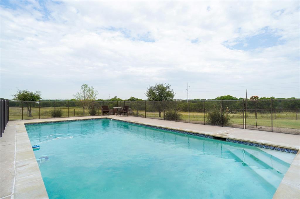 13340 John Day Road Haslet, TX 76052 - Photo 28 of 30 a view of a lake from a yard