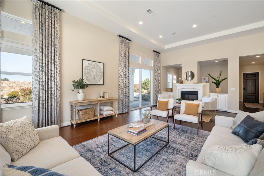 1541 Mesa Road Nipomo, CA 93444 - Photo 13 of 70 a living room with furniture a rug a fireplace and a large window
