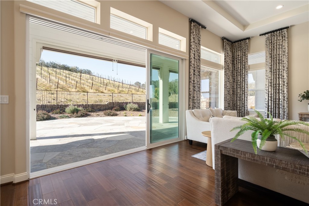 1541 Mesa Road Nipomo, CA 93444 - Photo 17 of 70 a living room with furniture and a potted plant