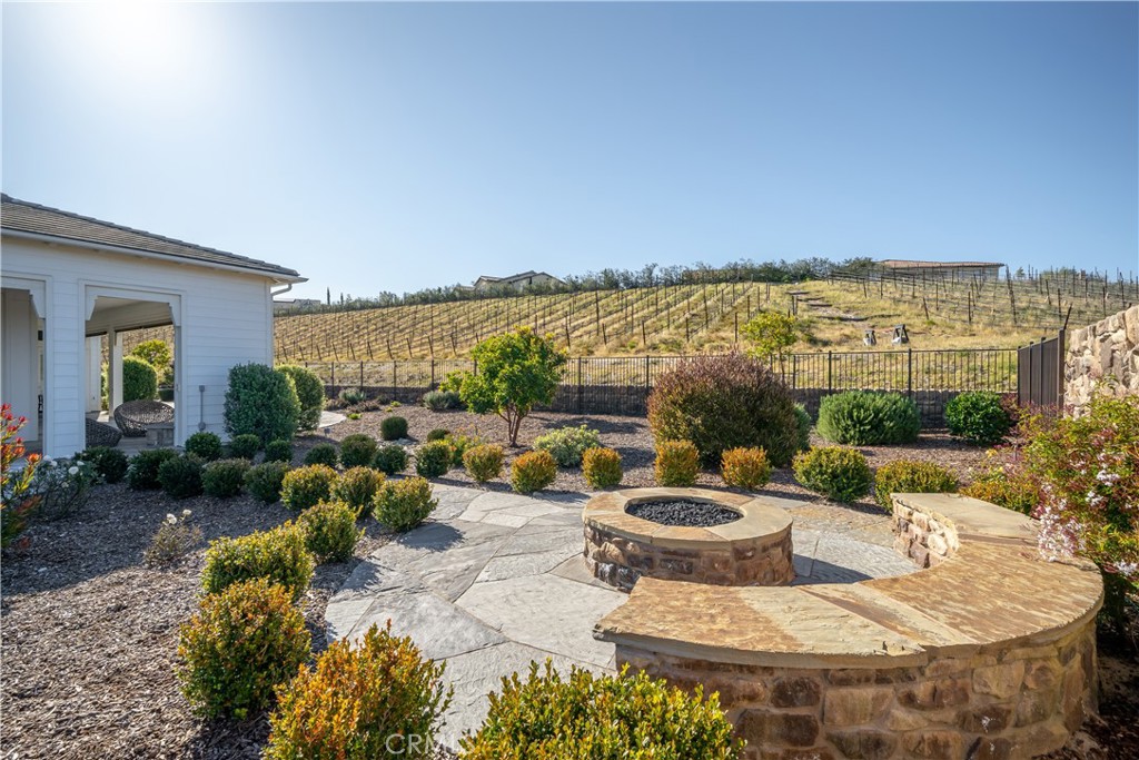 1541 Mesa Road Nipomo, CA 93444 - Photo 25 of 70 a view of a patio with couches chairs and potted plants