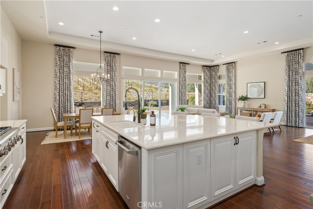 1541 Mesa Road Nipomo, CA 93444 - Photo 33 of 70 a large kitchen with stainless steel appliances a lot of counter space and a wooden floors