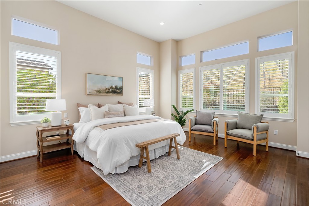 1541 Mesa Road Nipomo, CA 93444 - Photo 36 of 70 a bedroom with a bed and large wooden floor