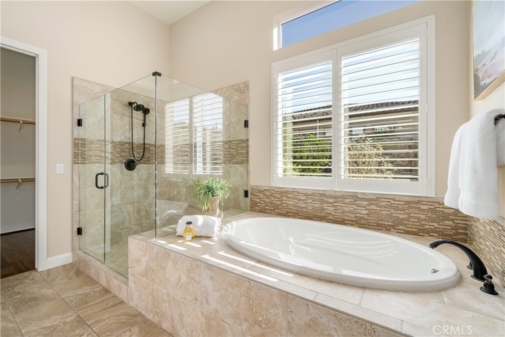 1541 Mesa Road Nipomo, CA 93444 - Photo 40 of 70 a bath tub sitting in a bathroom next to a window