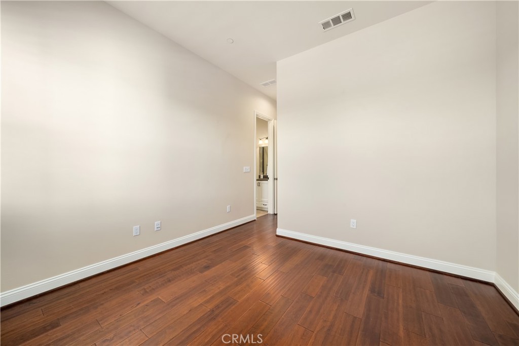 1541 Mesa Road Nipomo, CA 93444 - Photo 46 of 70 a view of an empty room with wooden floor