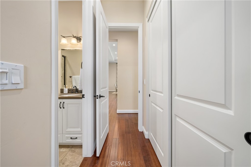 1541 Mesa Road Nipomo, CA 93444 - Photo 47 of 70 a view of a hallway with wooden floor and staircase