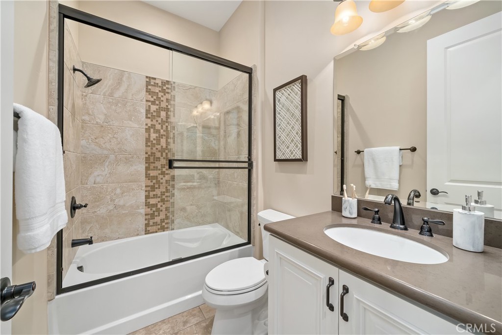 1541 Mesa Road Nipomo, CA 93444 - Photo 48 of 70 a bathroom with a granite countertop sink toilet and shower