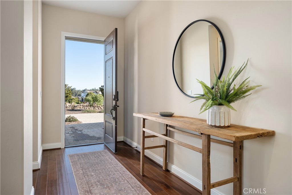 1541 Mesa Road Nipomo, CA 93444 - Photo 58 of 70 a view of a hallway with a mirror and a window