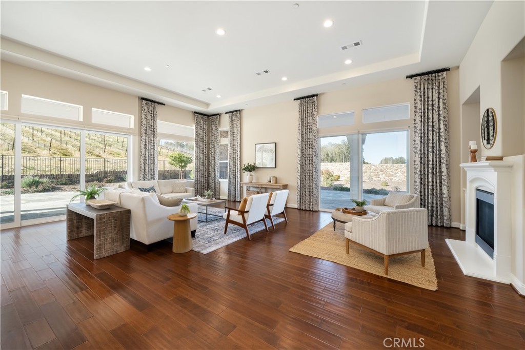 1541 Mesa Road Nipomo, CA 93444 - Photo 9 of 70 a living room with fireplace furniture and floor to ceiling windows