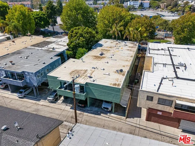 an aerial view of a house with a garden