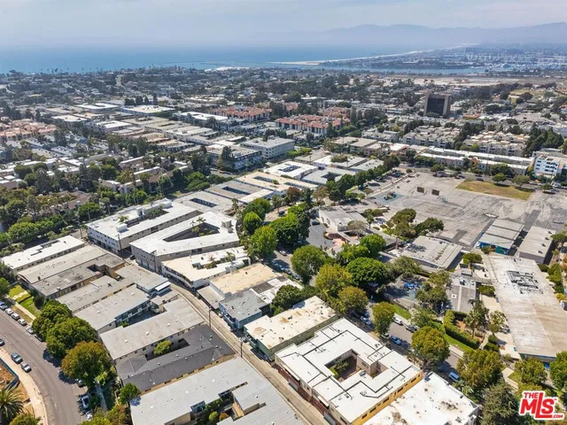 an aerial view of a city with lots of residential buildings