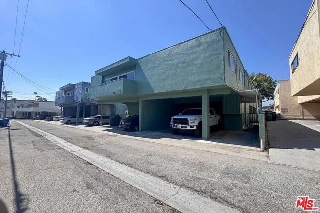 a view of a street with cars