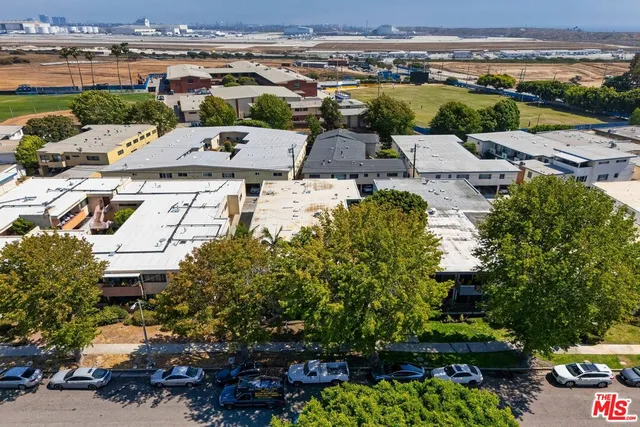 an aerial view of a house with a garden