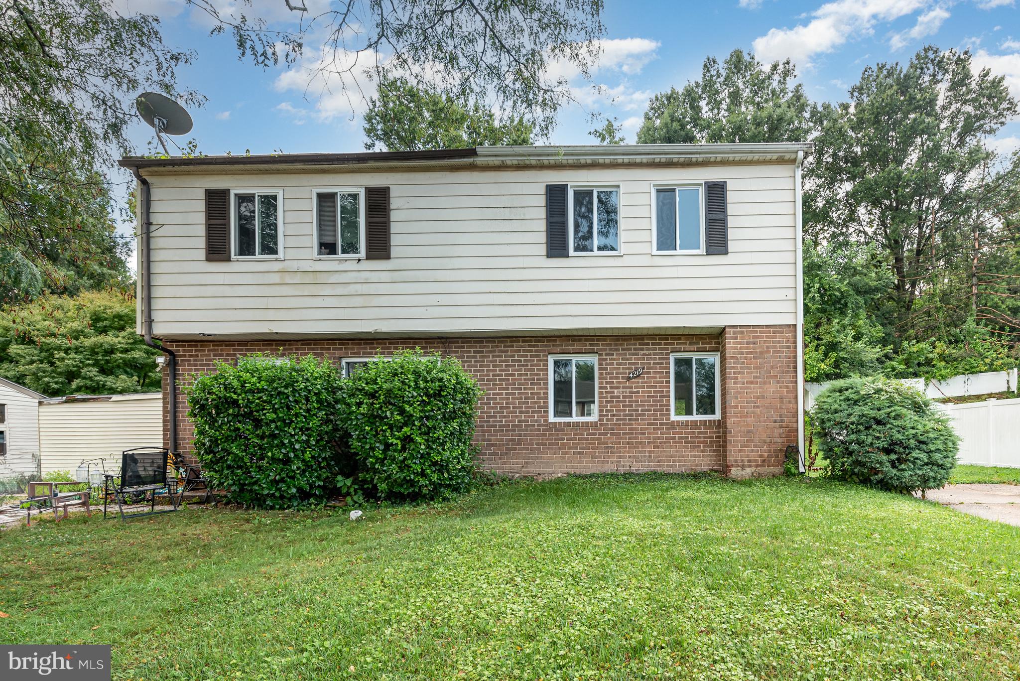 4219 Slater Avenue Nottingham, MD 21236 - Photo 1 of 25 a view of a house with a yard