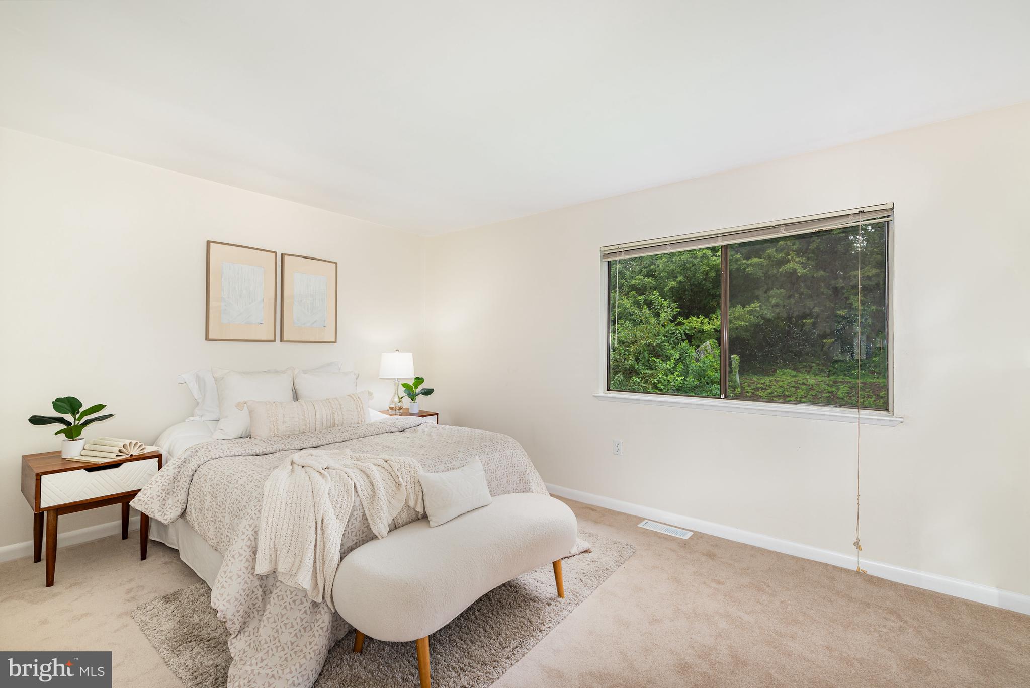 4219 Slater Avenue Nottingham, MD 21236 - Photo 13 of 25 a bedroom with a bed and a window