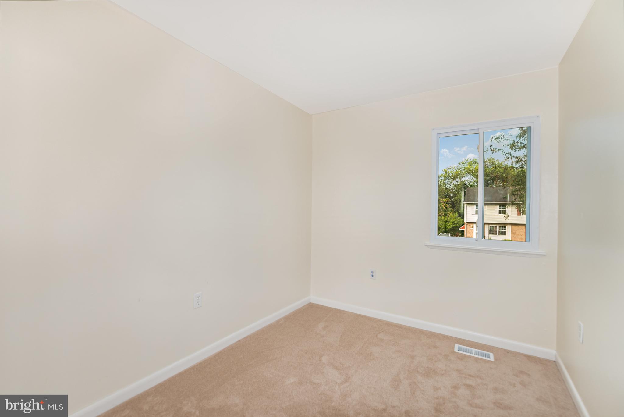 4219 Slater Avenue Nottingham, MD 21236 - Photo 19 of 25 an empty room with a window