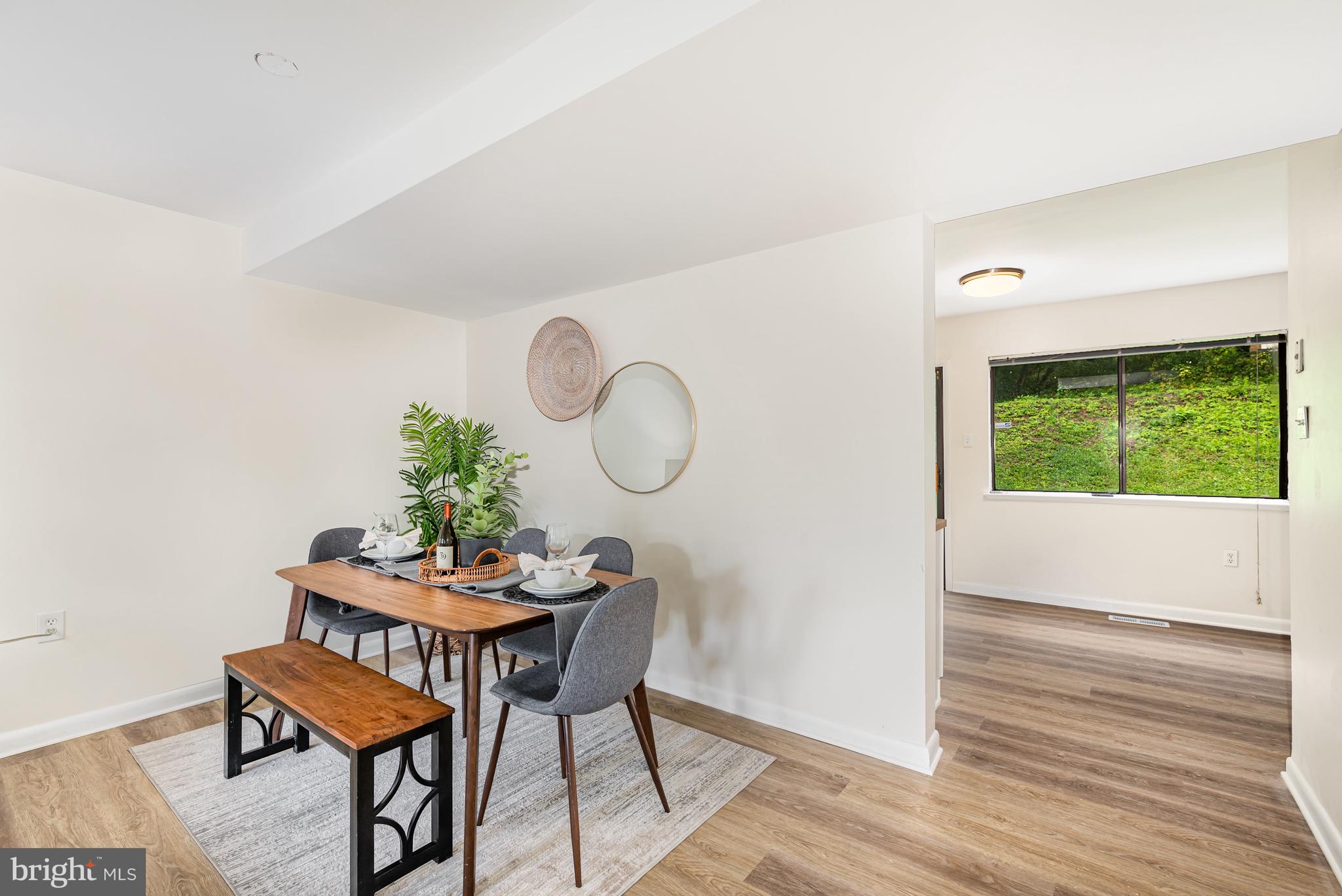 4219 Slater Avenue Nottingham, MD 21236 - Photo 6 of 25 a dining room with furniture and wooden floor