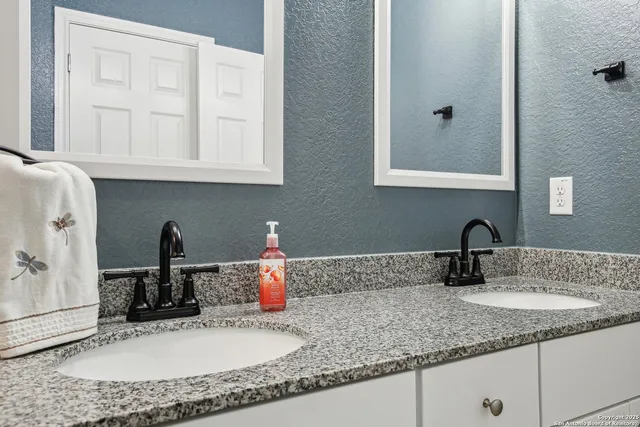 a living room with hard wood floors and a window