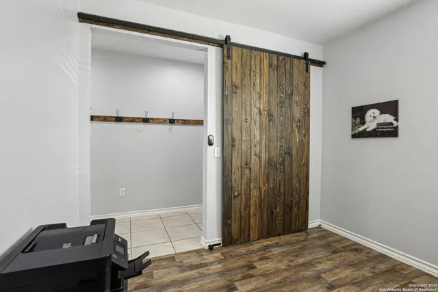a view of a elevator and an empty room