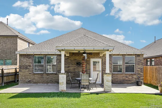 a front view of a house with patio