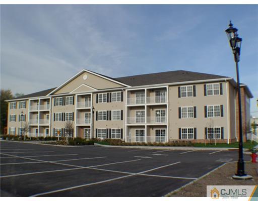 105 Liddle Avenue Edison, NJ 08837 - Photo 1 of 12 a front view of a building with a street