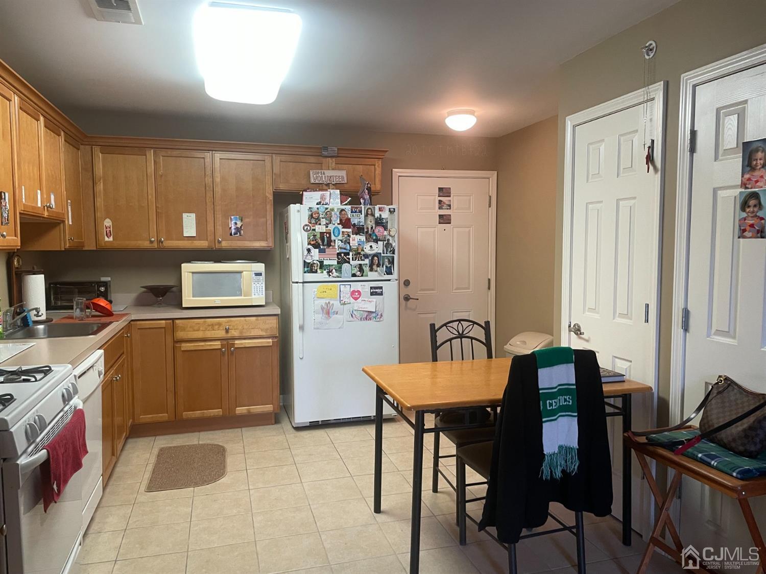 105 Liddle Avenue Edison, NJ 08837 - Photo 3 of 12 a kitchen that has a cabinets counter space and appliances