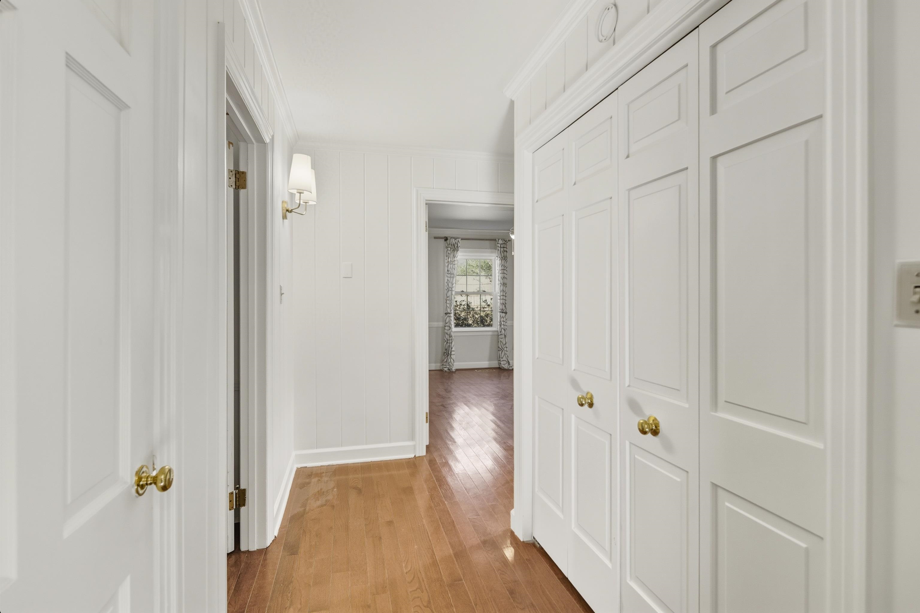 126 Rooks Drive Brownsville, TN 38012 - Photo 16 of 37 a view of a hallway with wooden floor