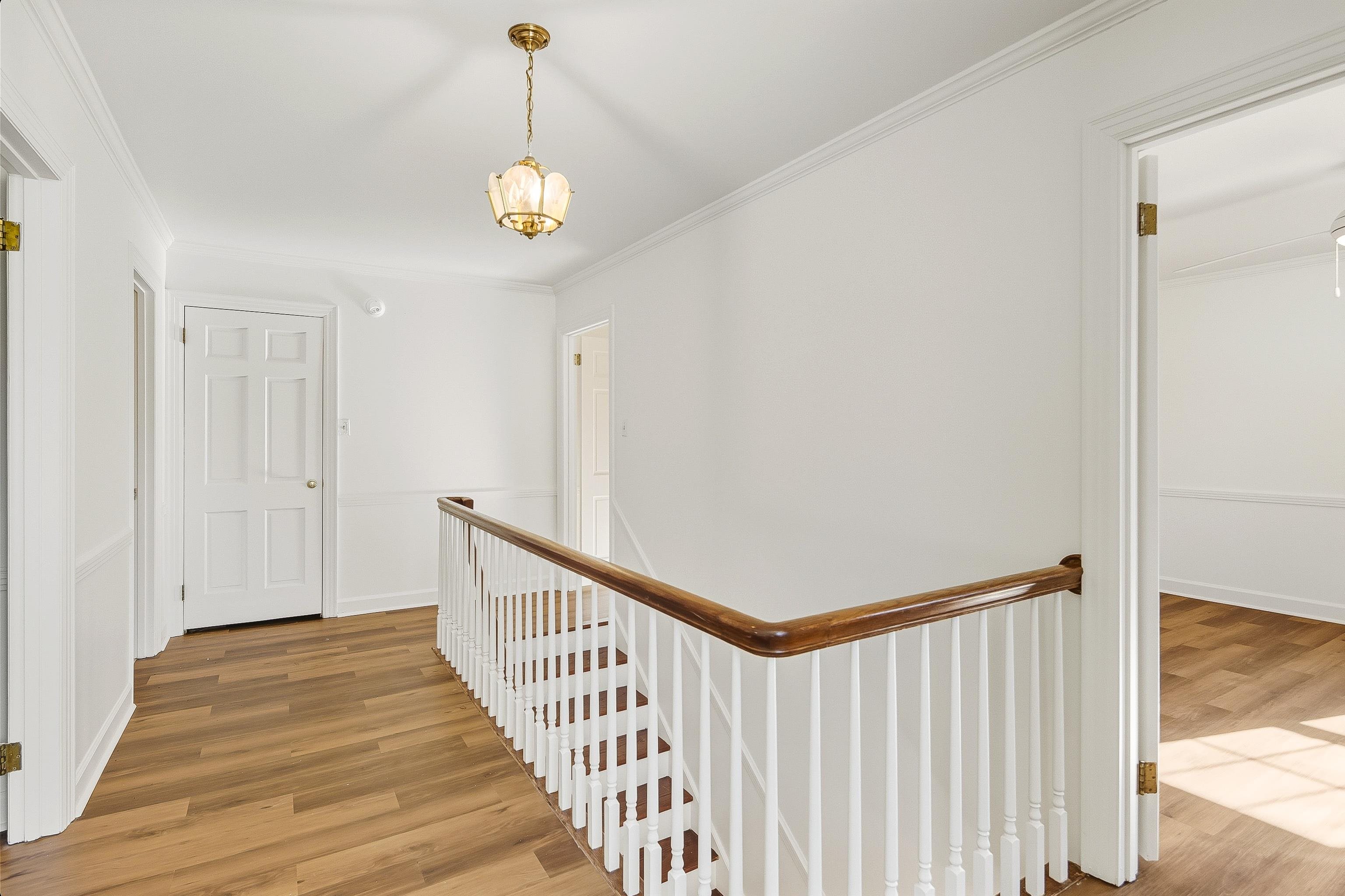 126 Rooks Drive Brownsville, TN 38012 - Photo 21 of 37 a view of a hallway with stairs