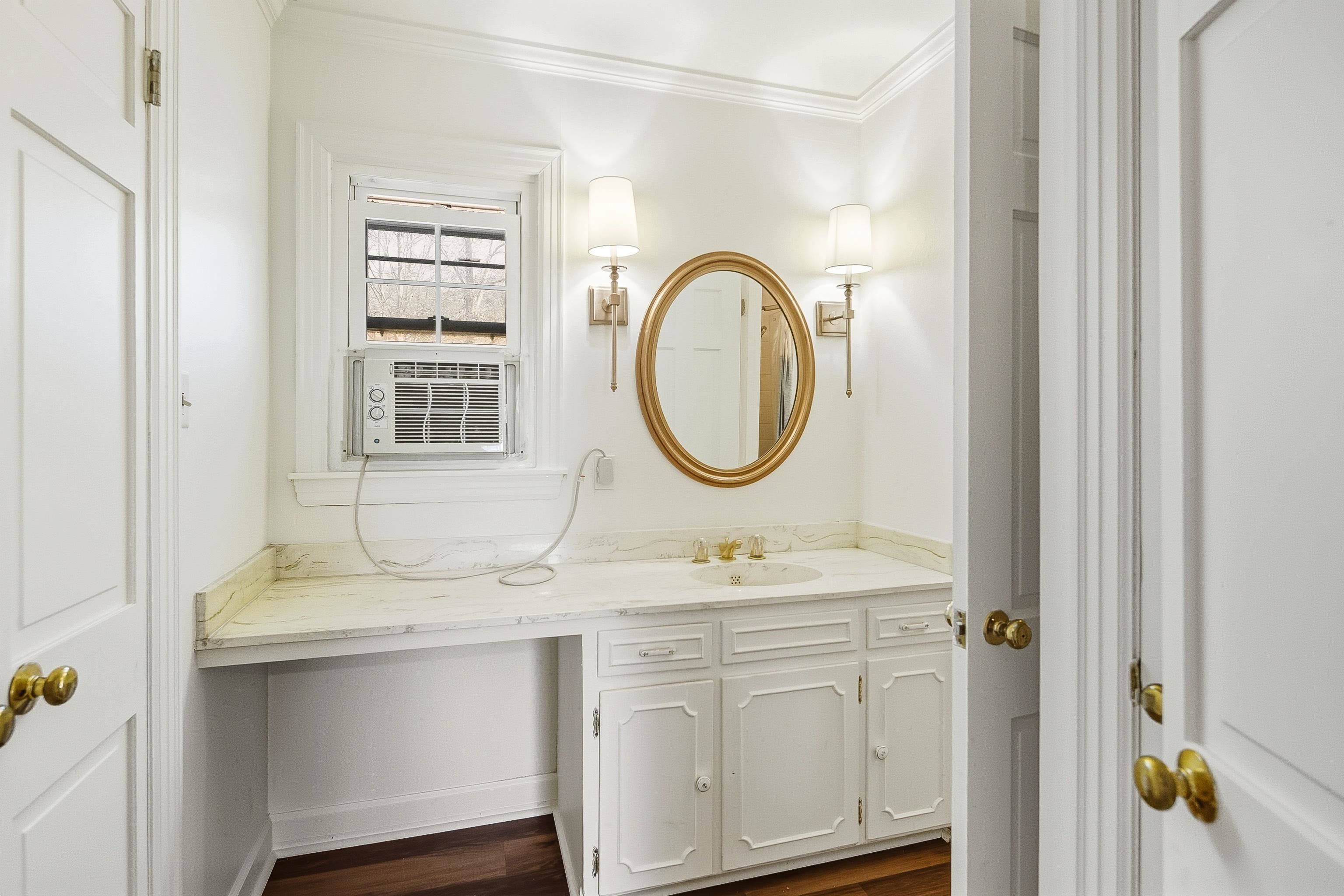 126 Rooks Drive Brownsville, TN 38012 - Photo 26 of 37 a bathroom with a sink and a mirror