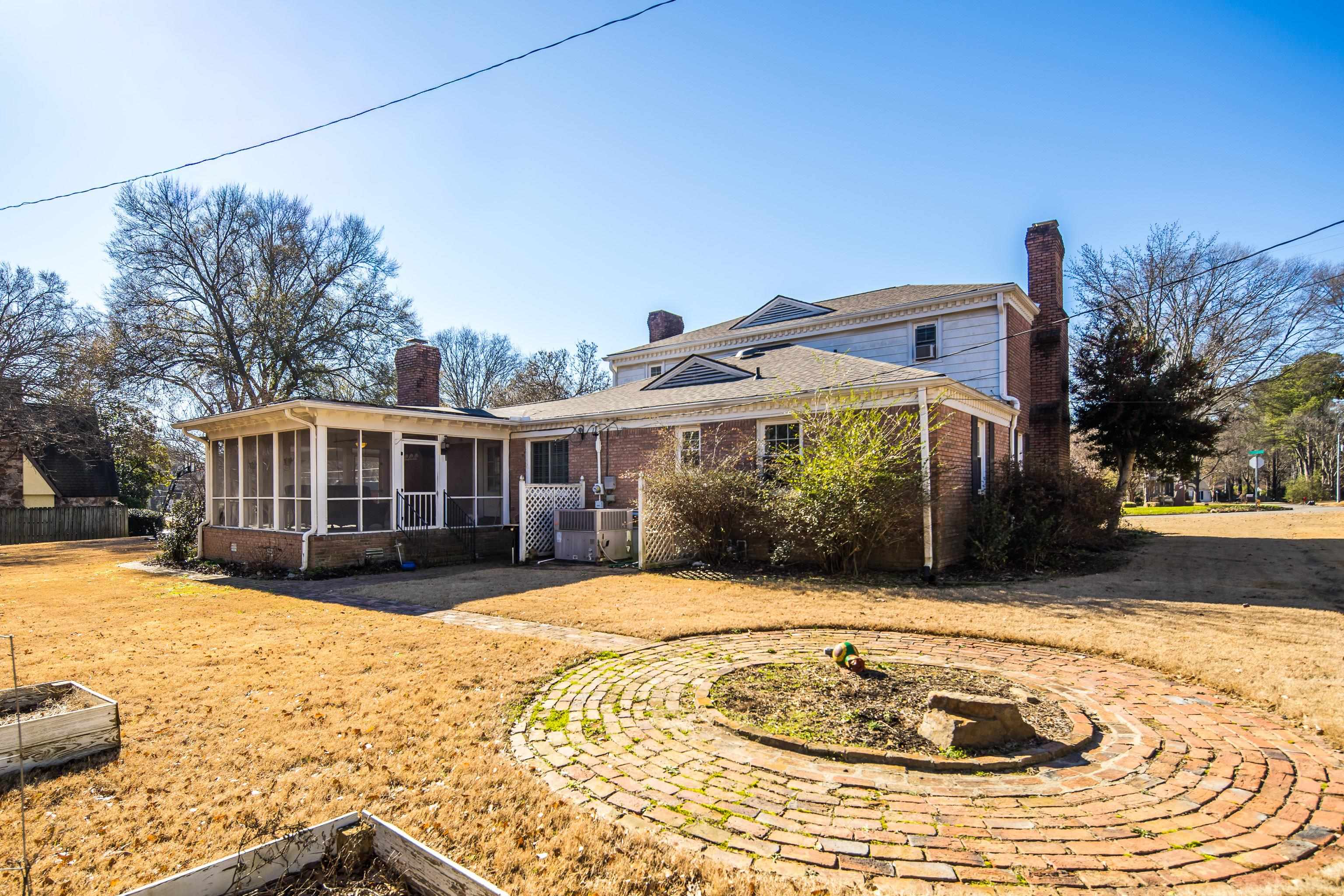 126 Rooks Drive Brownsville, TN 38012 - Photo 31 of 37 a front view of a house with a yard