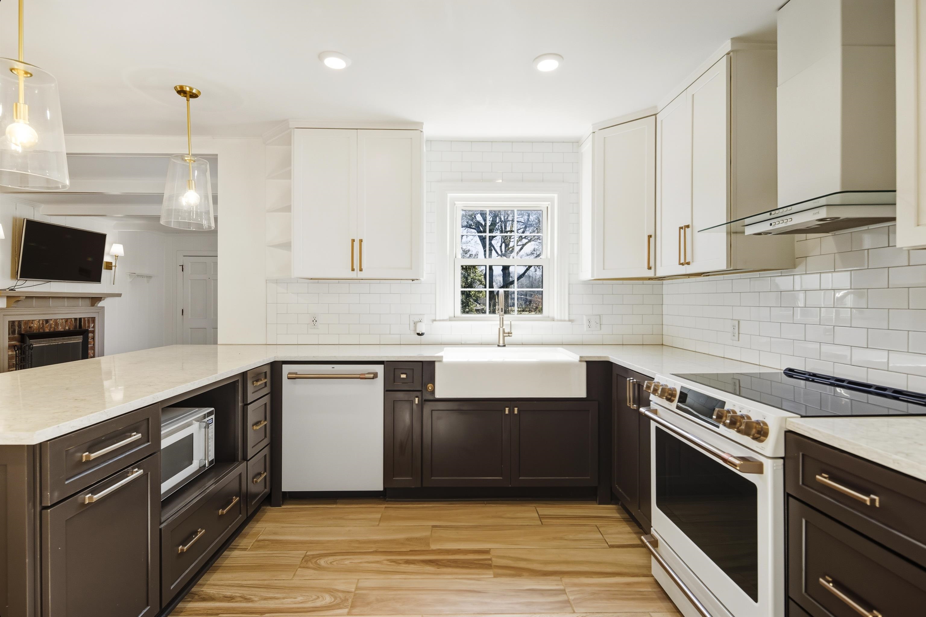 126 Rooks Drive Brownsville, TN 38012 - Photo 10 of 37 a kitchen with a sink stove top oven and cabinets