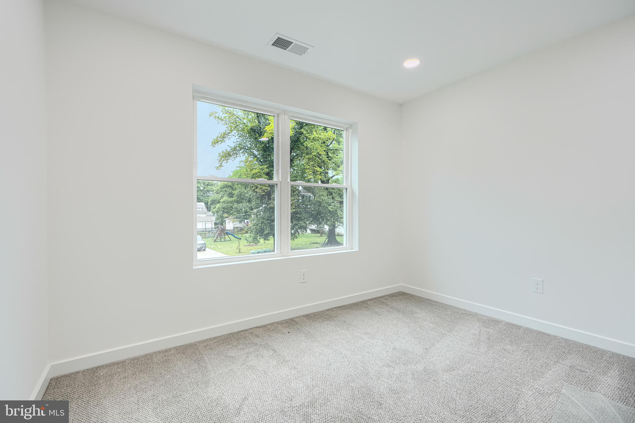 3410 Pinkney Road Baltimore, MD 21215 - Photo 27 of 55 an empty room with a window