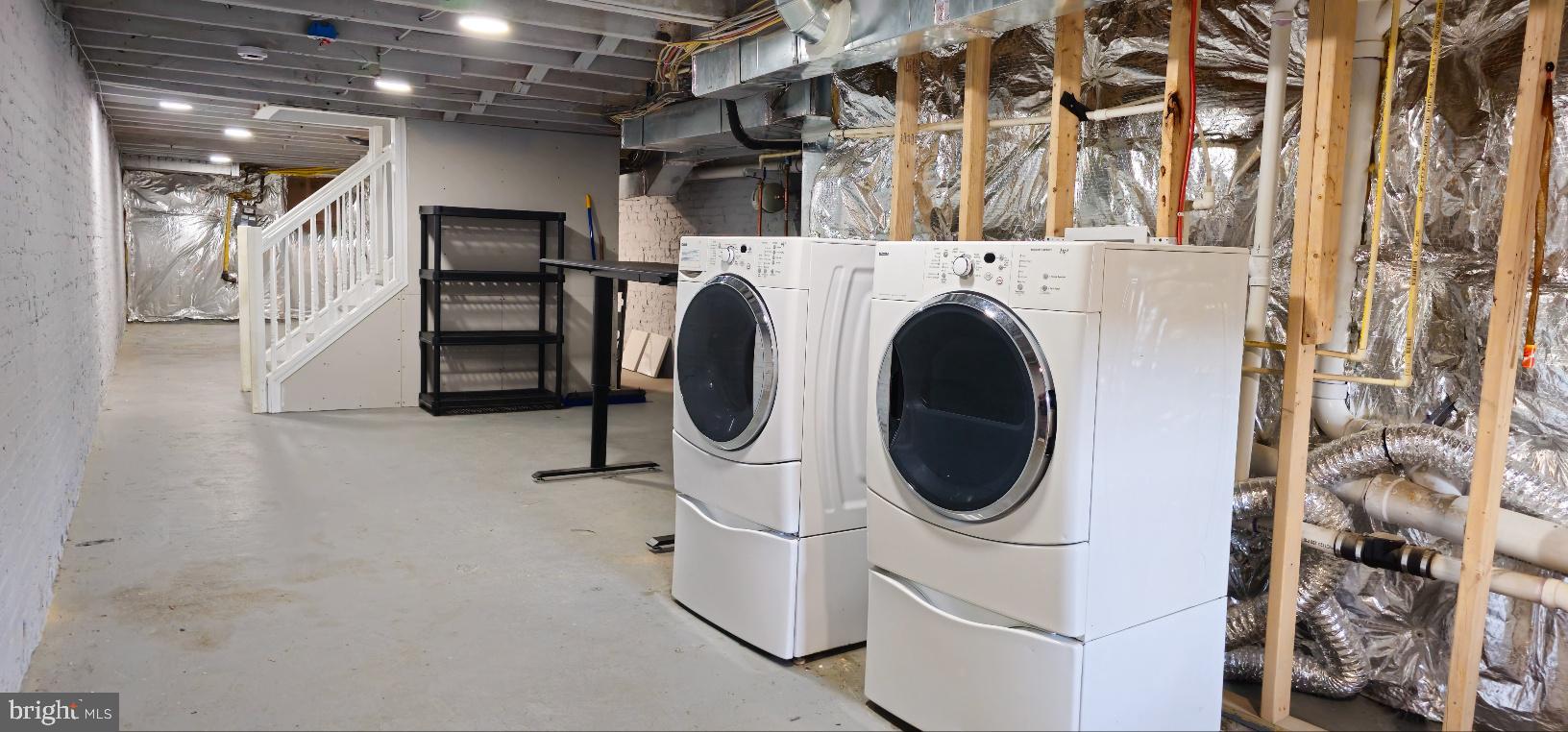 5 East 27th Street Baltimore, MD 21218 - Photo 28 of 34 a utility room with dryer and washer