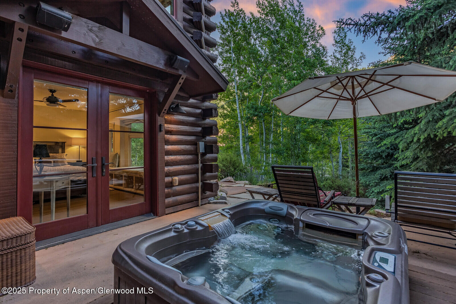 389 Elk Mountain Drive Redstone, CO 81623 - Photo 24 of 64 a view of a backyard with furniture and a grill