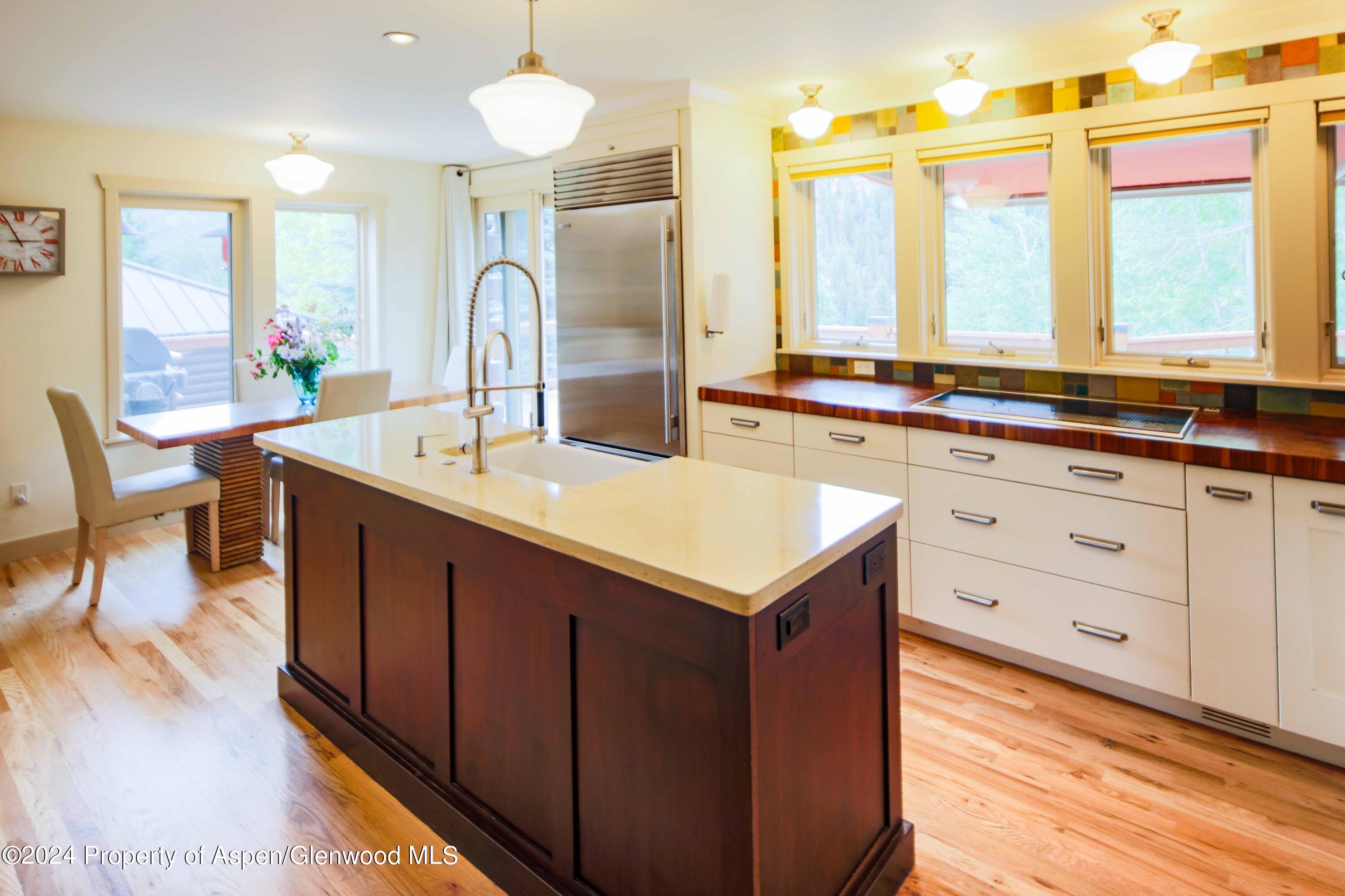 389 Elk Mountain Drive Redstone, CO 81623 - Photo 29 of 64 a bathroom with a sink and a mirror