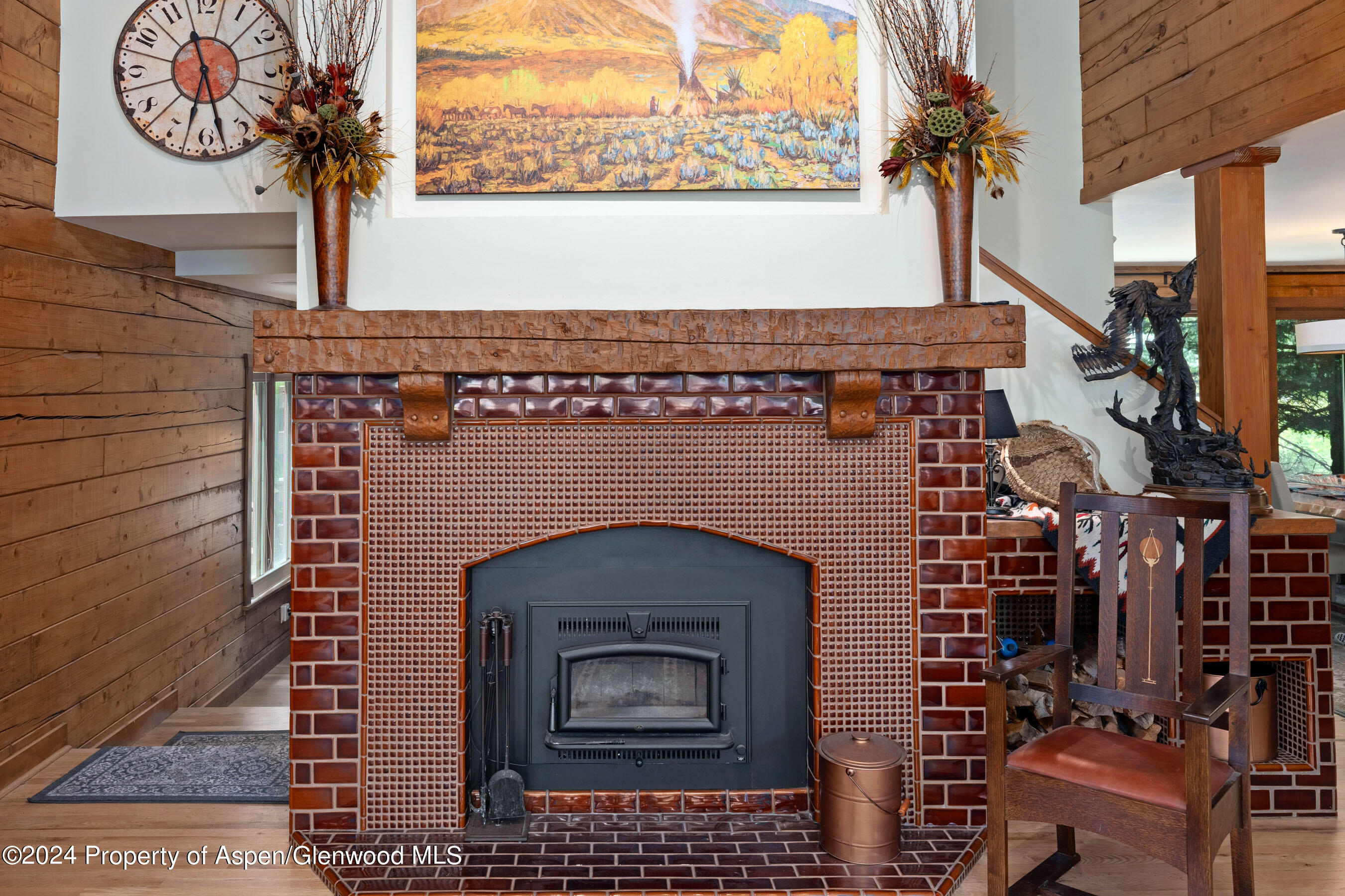 389 Elk Mountain Drive Redstone, CO 81623 - Photo 42 of 64 a close view of a fireplace with wooden floor